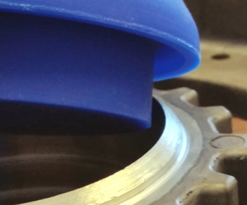 Masked and anodized aluminum with steel insert part showing clean, sharp edge lines using Viadon custom masking Masked and anodized aluminum with steel insert part showing clean, sharp edge lines using Viadon custom masking